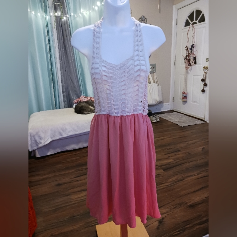 Hot and delicious mini dress with knit top and coral bottom.